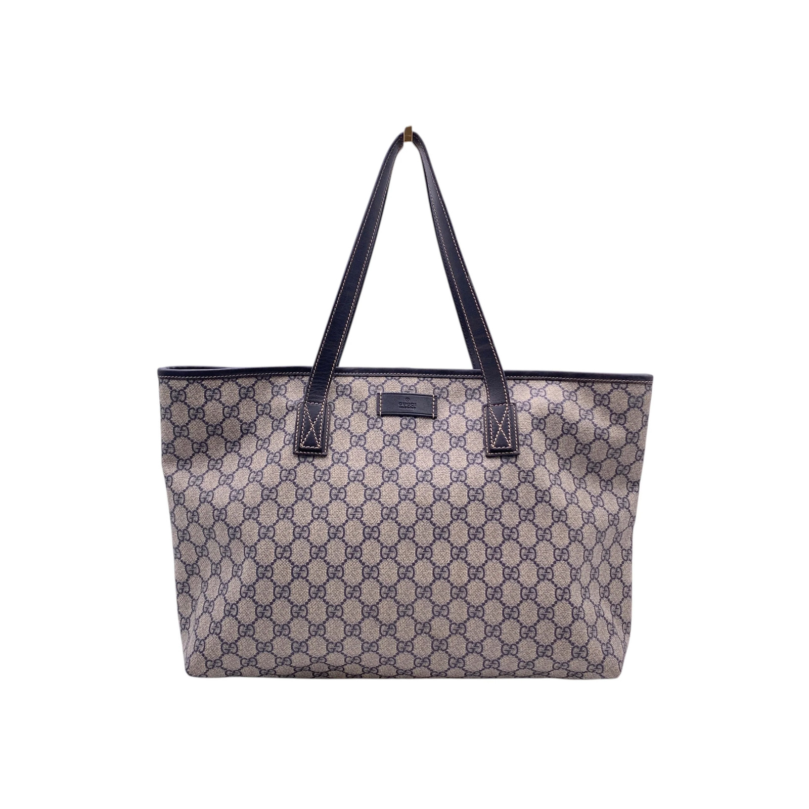 Borsa a tracolla tote Gucci in tela Monogram beige e blu navy