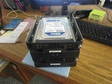 2 Western Digital WD5000AAKX 500GB SATA Drives in RAID Module. Good Used.