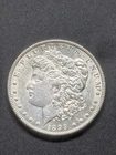 NO RESERVE 1899-P Philadelphia Minted Morgan Silver Dollar AU Breast Feathers