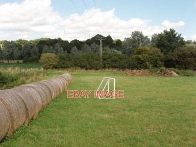PHOTO  STRAW BALES SURROUND A FOOTBALL PITCH POLSTEAD STRAW BALES ARE DIFFICULT