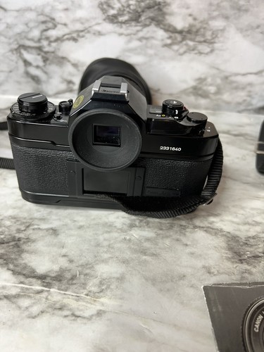 Canon A-1 analoge Kleinbildkamera mit ZYKKOR 62mm UV-Objektiv, Handbuch und Tasche - Bild 6 von 15