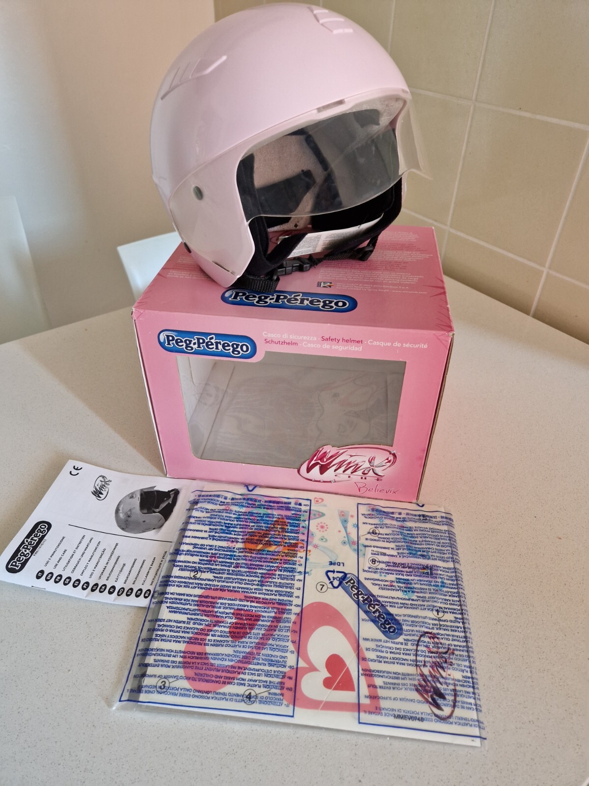 Casco rosa da bambina Peg Perego Winx giocattolo
