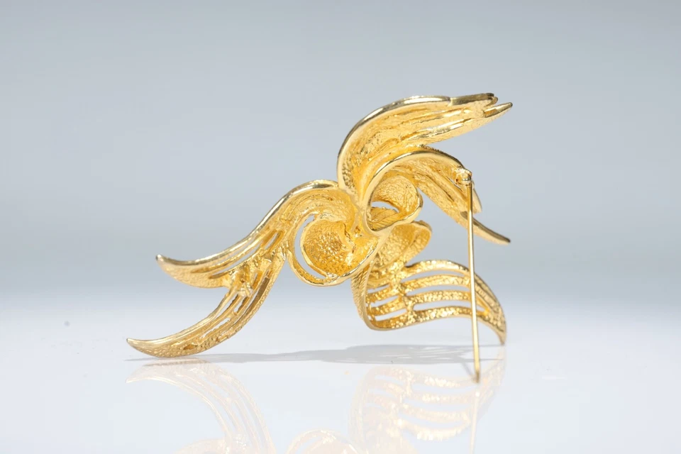 Broche grande cinta en bucle abstracto tono dorado Foto 2 de 4