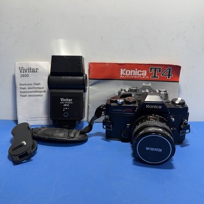 Konica Autoreflex T4 Film Camera + Hexanon 50mm f/1.7 + Vivitar 2800 Flash. Read