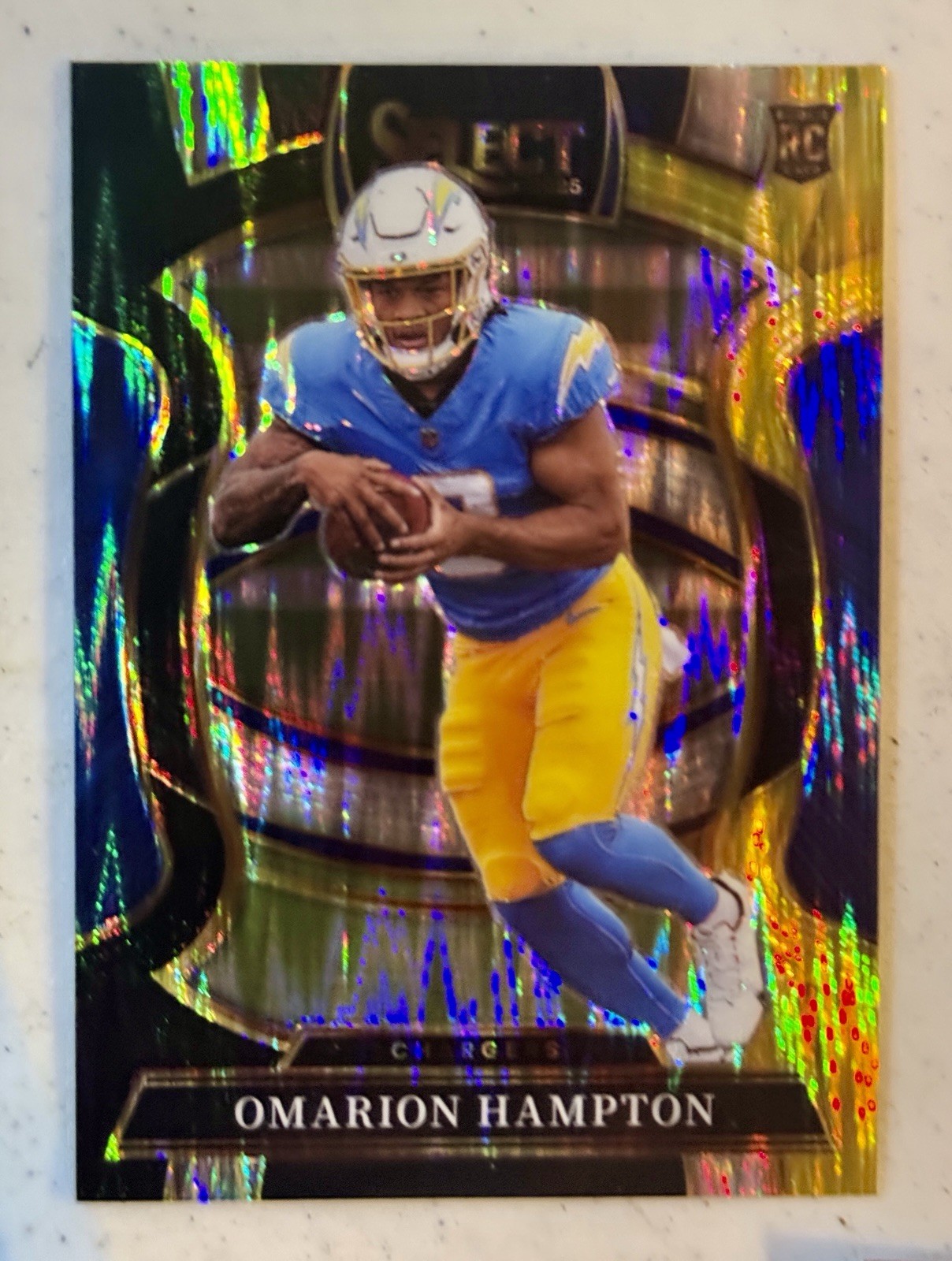 2025 Panini Select - Concourse Omarion Hampton #2 Black & Gold Shock Prizm (RC)