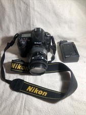 Nikon D90 Digital SLR Camera/35- 105mm lens/battery  charger VG cond Works