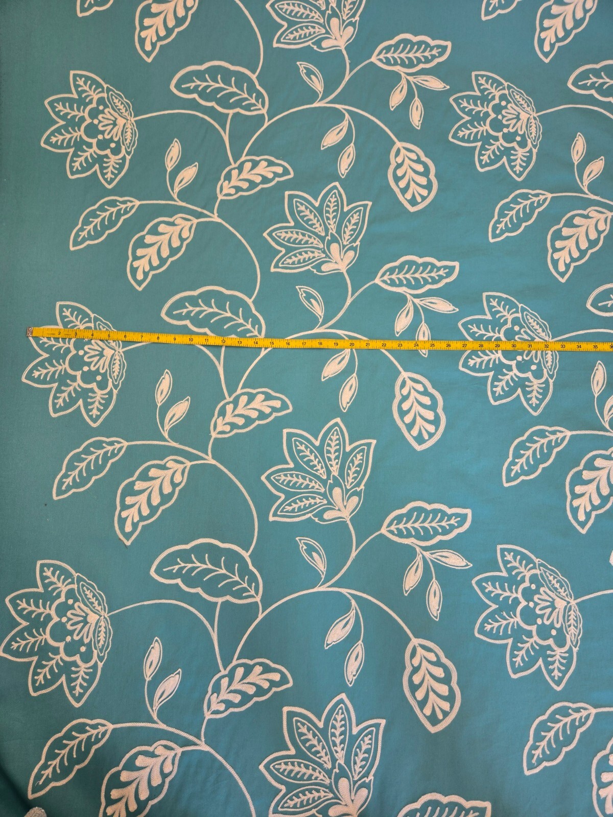 Teal embroidered fabric for drapery bedding and pillows-image