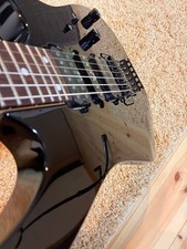 Guitarra Eléctrica Ibanez RG570 Negra HSH Edge Trémolo FujiGen Hecha en Japón