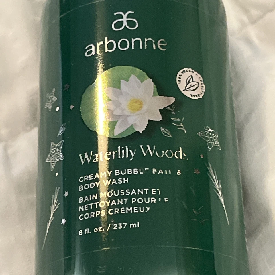Jabón corporal y baño de burbujas cremosas fragancia madera nenúfar Arbonne 8 fl oz Foto 2 de 4