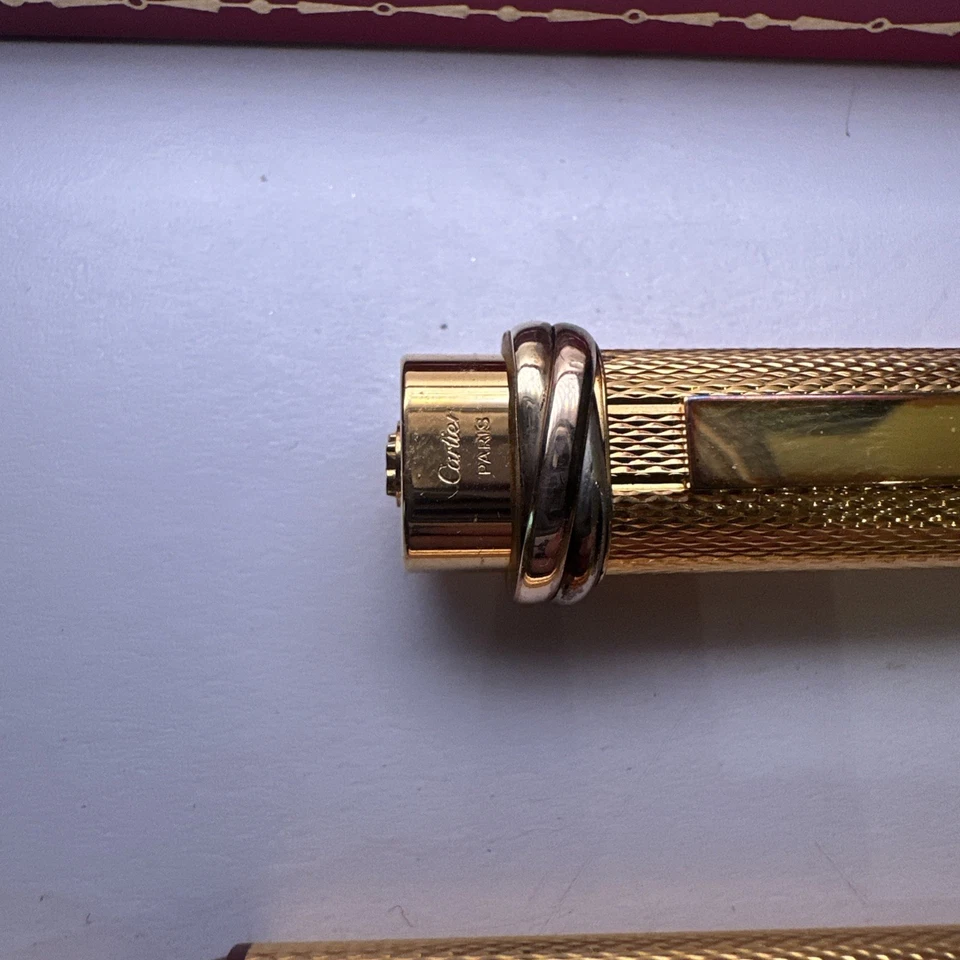 Auténtico bolígrafo Cartier Must de Cartier Trinity Vendome oro 3 anillos con caja Foto 3 de 4