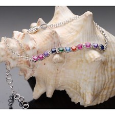 BRACCIALE  CON QUARZI  IN ORO BIANCO  750/1000. ,  18 KT