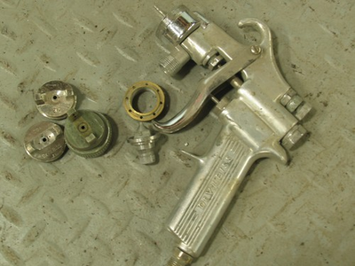 #ad DEVILBISS Spray Gun with extra parts shown $249.00