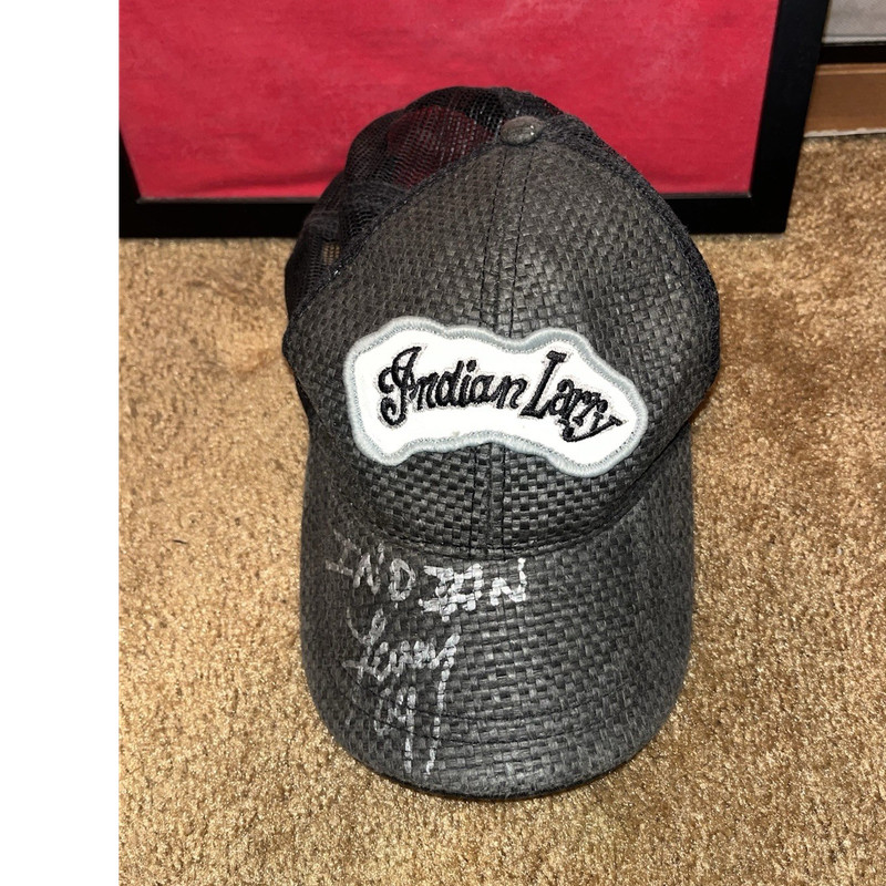 Indian Larry signed hat and framed shirt. From 2004