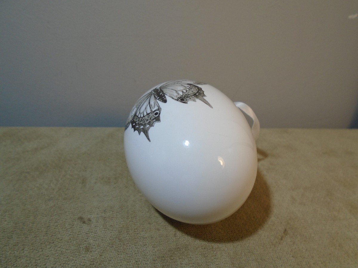 WHITE CERAMIC EGG SHAPED WITH BUTTERFLY PRINT 3” ORNAMENT