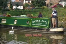 PHOTO  'FESTINA LENTE' AT ANDERTON A NARROWBOAT PREPARES TO TURN OFF THE TRENT A