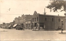 MAIN STREET hartley, ia 1910s postcard real p...