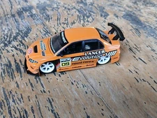 Jada Option D Mitsubishi Lancer Evolution Evo VI 1:64 PASTEL Orange