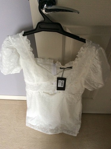 NASTY GAL BRODERIE RUFFLE CUT OUT MINI 