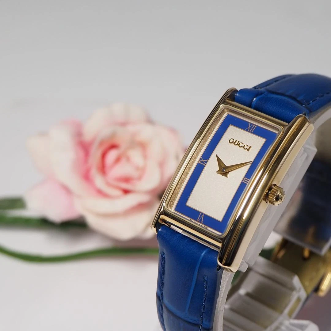 Montre femme Gucci ceinture carrée cuir or F214