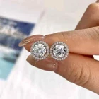 2Ct Round Cut Real Moissanite Halo Women's Stud Earrings 14K White Gold Plated