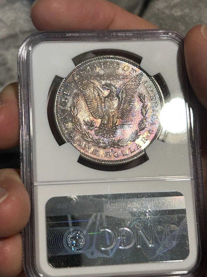 Dólar de plata Morgan 1879 S graduación profesional MS-62 TONIFICADO tono arco iris Foto 2 de 4
