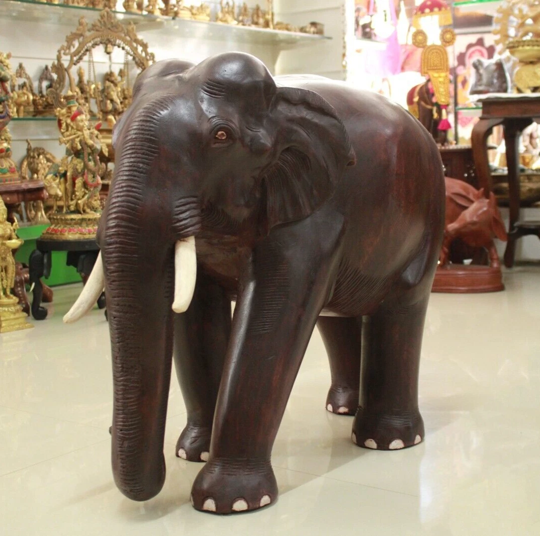 Wooden elephant statues 2025
