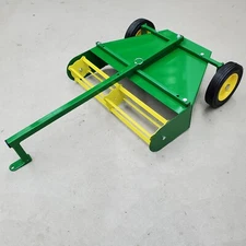 Pedal tractor center pivot haybine attachment Green