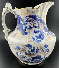 DUNN BENNETT & CO. FLOW BLUE AND GOLD FLORAL PITCHER