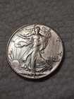 1942 Walking Liberty Half Dollar In F To VF Condition In My Opinion. Z