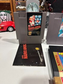 Nintendo Super Mario Bros. 1,2,3, and Pac-mania for Nintendo NES Game Cartridge