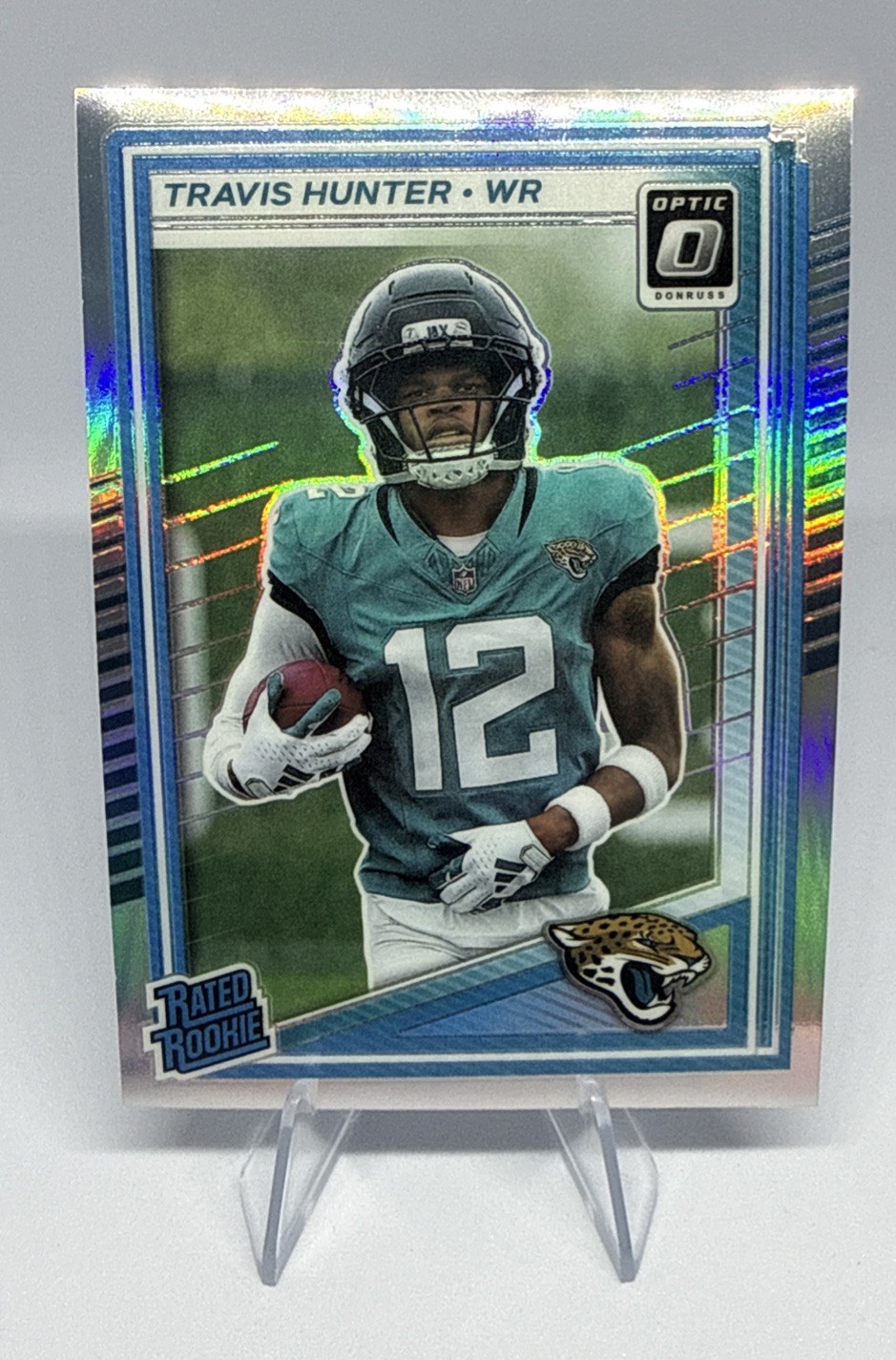 2025 Panini Donruss Optic - Rated Rookie Travis Hunter #201 Holo Prizm (RC)