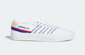 white adidas canvas trainers