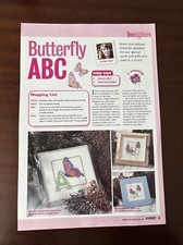 Gráficos de punto de cruz del alfabeto mariposa **de una revista**