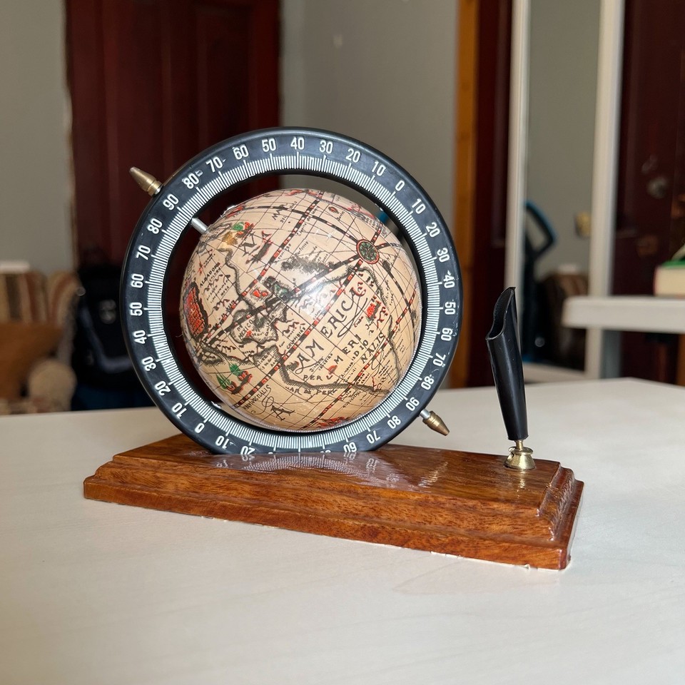 A spinning Old World globe that doubles as a pen holder — it's a tiny desktop adventure that makes any desk feel like a Victorian explorer's study.