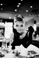 Breakfast at Tiffanys Laminated Audrey Hepburn is Holly Golightly Poster 24 x 36
