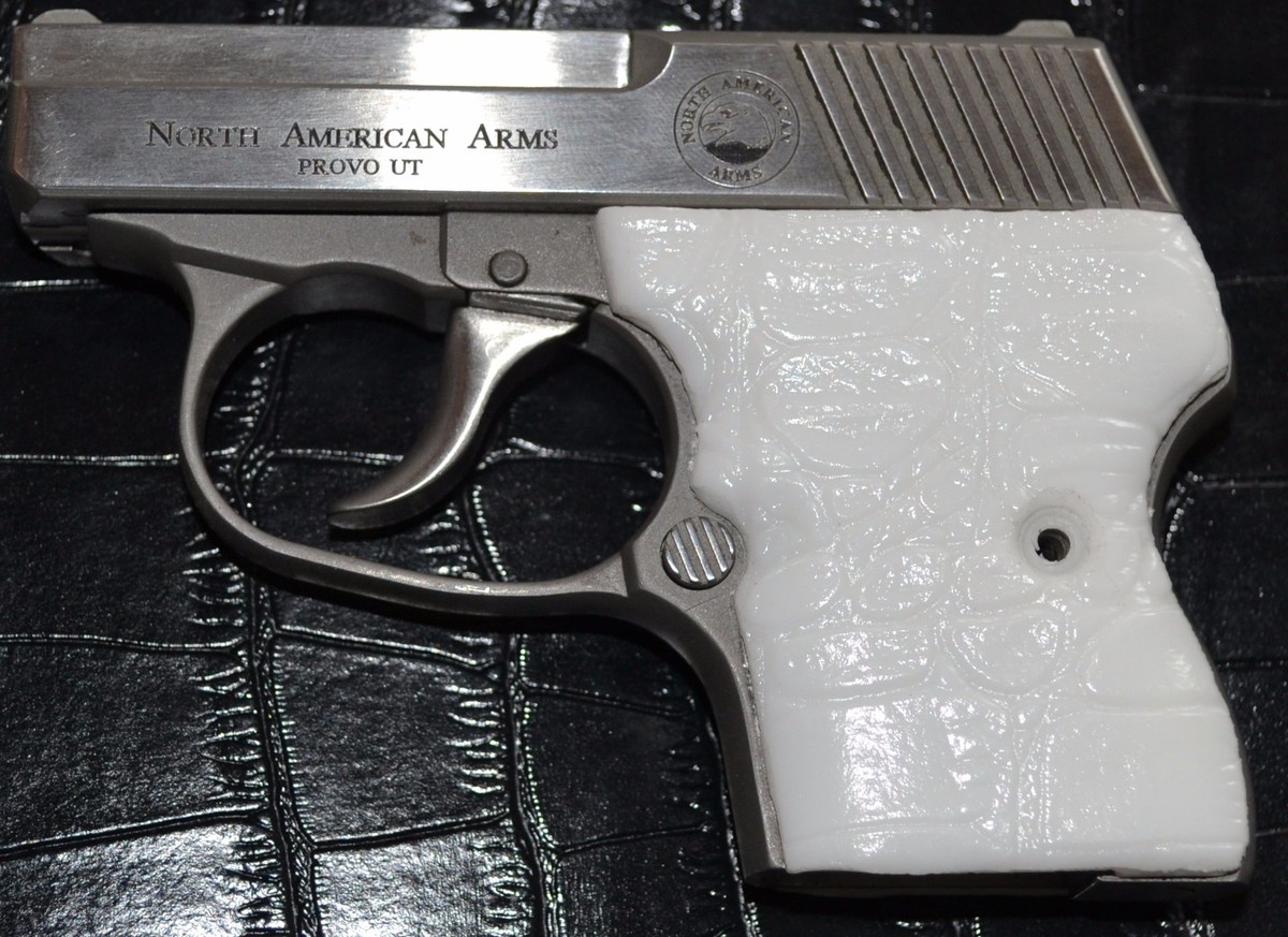 North American Guardian 25, 32 pistol grips pure white gator skin