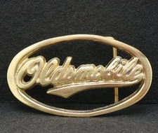 WB15124 *NOS*  VINTAGE 1970s BARON ***OLDSMOBILE*** CAR SOLID BRASS BELT BUCKLE