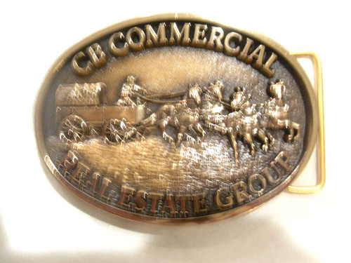 CB COMMERCIAL REAL ESTATE GROUP BELT BUCKLE MADE BY JOSTENS