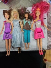 Barbie Lot Of 4 Dolls & Barbie  Sold As-is And It Works