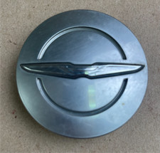 Chrysler Oem Silver Center Cap. 1lb74trmab 2.5 Diameter.