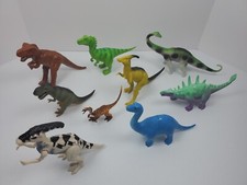 Miscellaneous Lot of 9 Dinosaur Toys Figures Various Colors Sizes and brands.