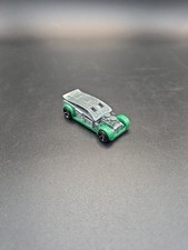 2010 HOT WHEELS FAST CASH 1:64 GREEN & SILVER DIECAST CAR
