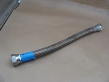 STAINLESS STEEL BRAIDED HOSE 17" LONG  1-1/2" FEMALE FITTINGS (SOME DAMAGE)