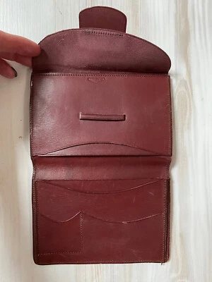 Portefeuille marron en cuir - Photo 1/4