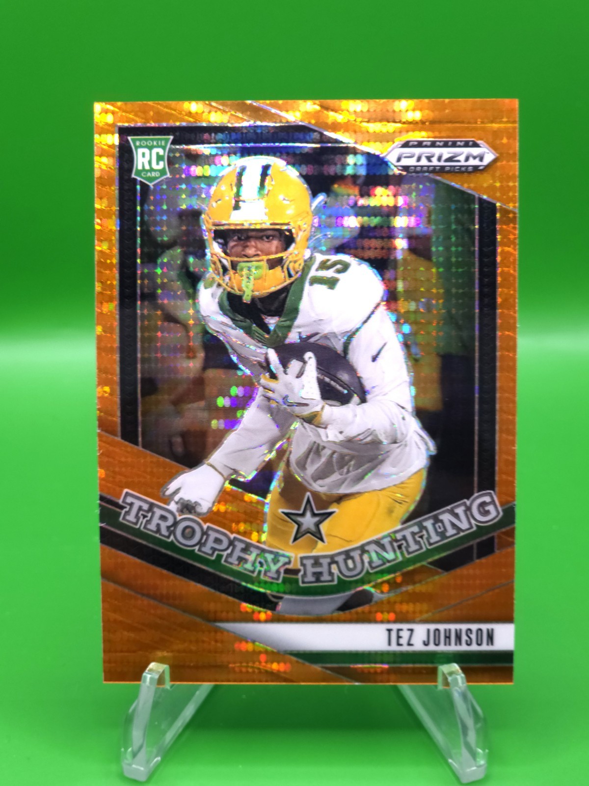 2025 Panini Prizm Draft Picks Tez Johnson Trophy Hunting Orange Pulsar Prizm /75