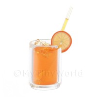 Miniature Vodka Orange Cocktail In A Long Glass Miniature Vodka Orange Cocktail In A Long Glass