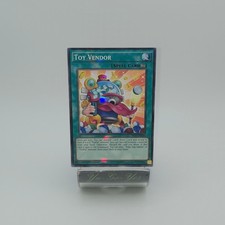 SP15-DE043 Spielzeugverkäufer Shatterfoil Rare 1. Auflage YuGiOh Karte Mint