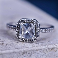 Size 8.25, vintage Sterling 925 silver engagement ring with cluster Cz around
