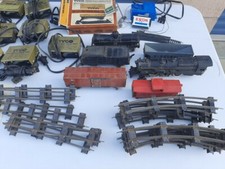 The american flyer train, tracks, and assorted controlers and tranformers