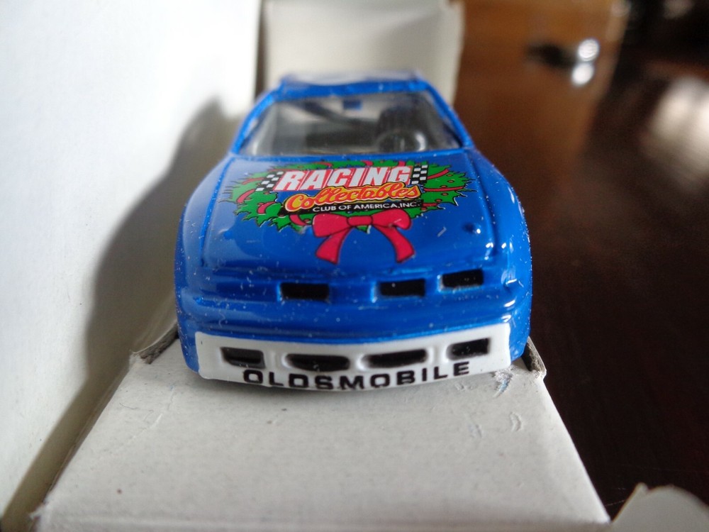 KRIS KRINGLE #93 MERRY CHRISTMAS 1993 OLDS CUTLASS 1/64 RACING COLLECTABLES